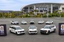 Armada kendaraan Kia Corporation yang akan digunakan sebagai transportasi resmi FIFA World Cup 2026 berjejer di area stadion, menampilkan berbagai model mulai dari SUV, MPV hingga mobil listrik untuk mendukung mobilitas selama turnamen.