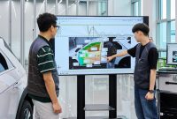 Engineers review dynamic motion validation results.