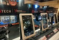 Deretan produk dashcam berbasis AI hasil kolaborasi Yoong Motor dan Mobile Tech dipamerkan dalam ajang IMX 2026 di ICE BSD, Tangerang, Sabtu (10/10/2026).
Keterangan Foto 2: Stan Yoong Motor menampilkan.